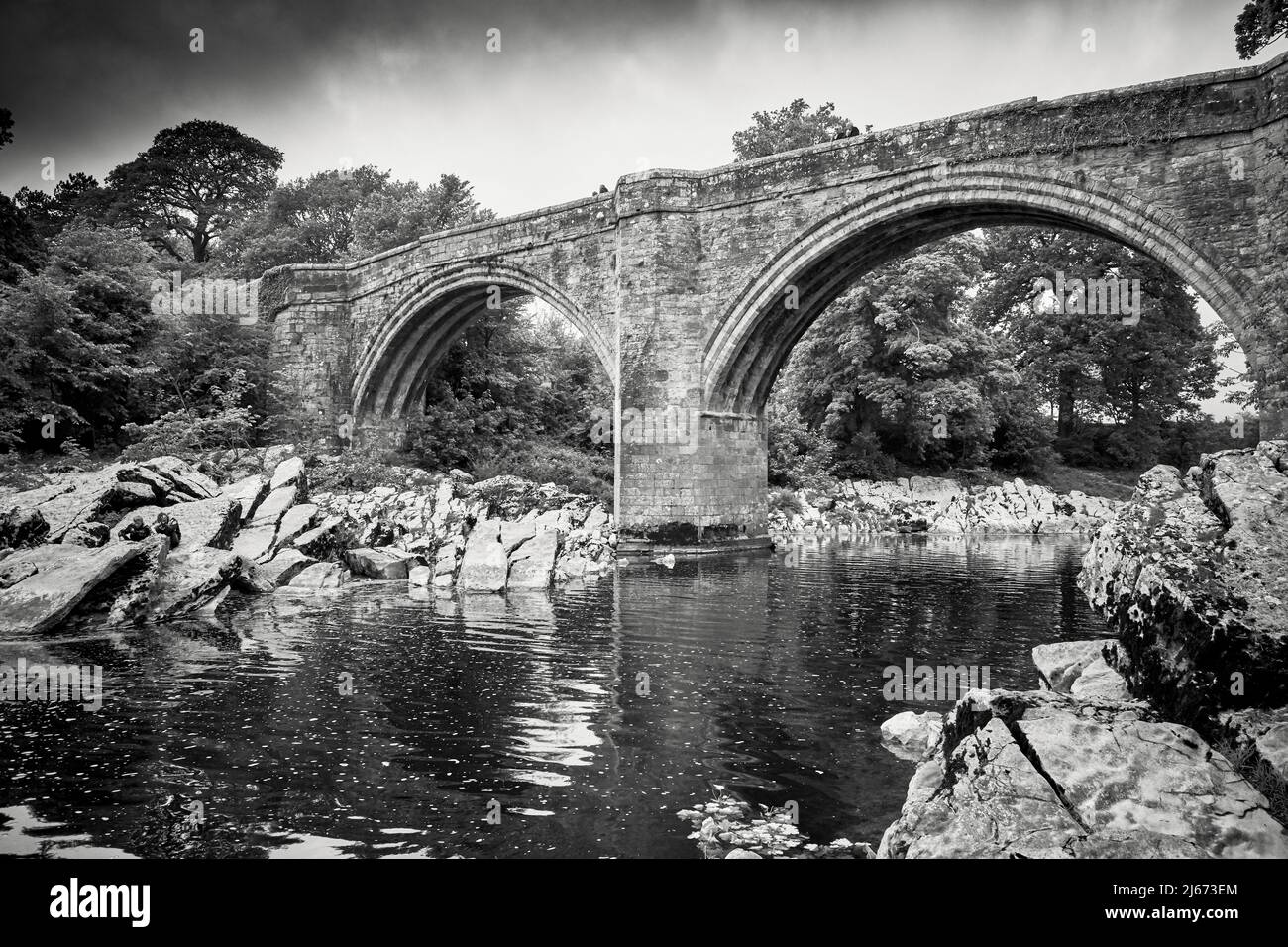 Devils Bridge, Kirkby Lonsdale which dates from the 12th or 13th century was a major crossing point of the River Lune until the early 20th century Stock Photo