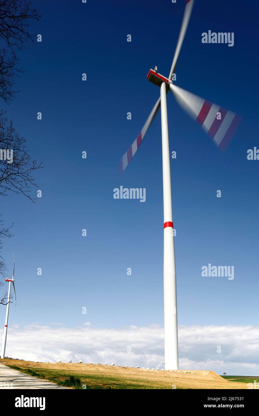 Wind turbine and blue sky Stock Photo - Alamy