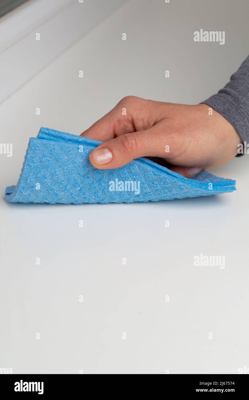 Rag for cleaning dust from the surface. Stock Photo