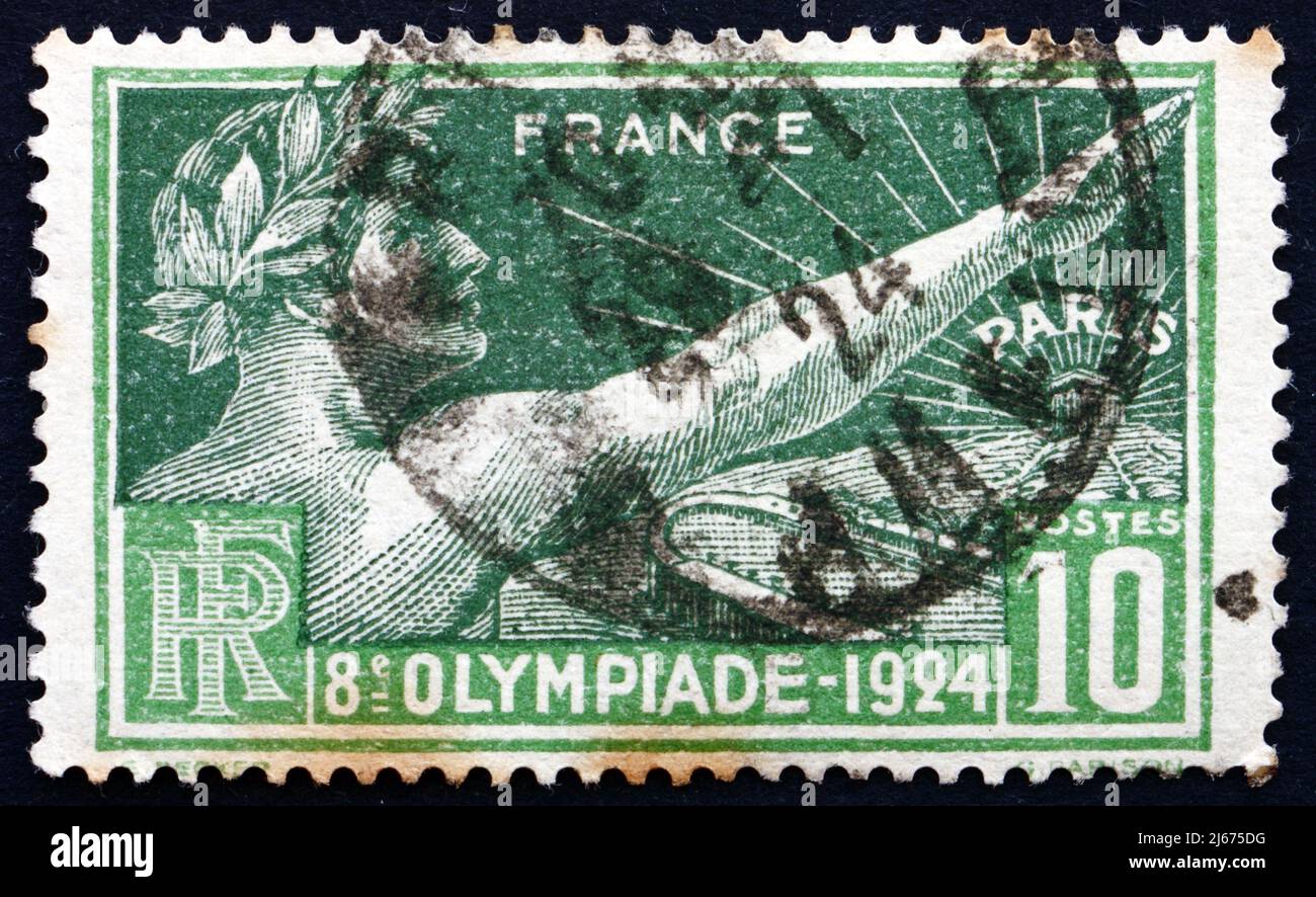 FRANCE - CIRCA 1924: a stamp printed in the France shows Victorious Athlete, Allegory of Olympic Games at Paris, 8th Olympic Games, Paris, circa 1924 Stock Photo