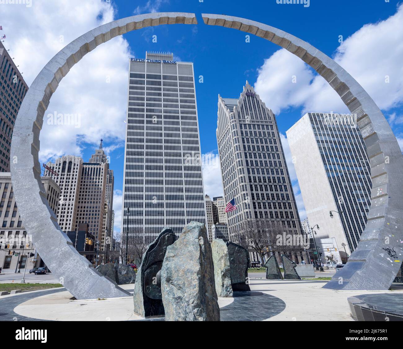 Transcending arch monument at the Philip A. Hart Plaza, downtown Detroit, Michigan, USA, with view of skyscrapers Stock Photo