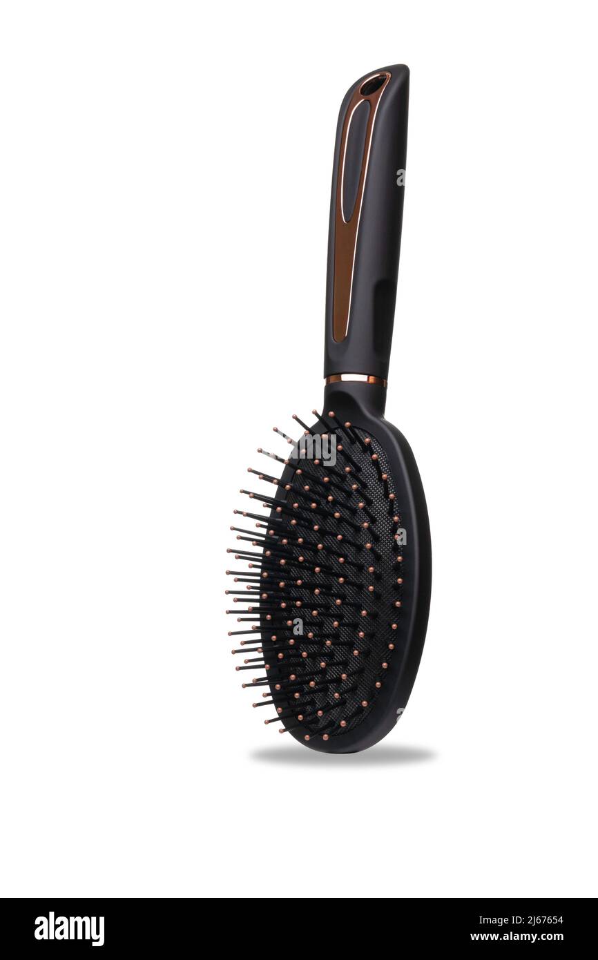 Hairbrush isolated on white background. Black and gold hair brush cut