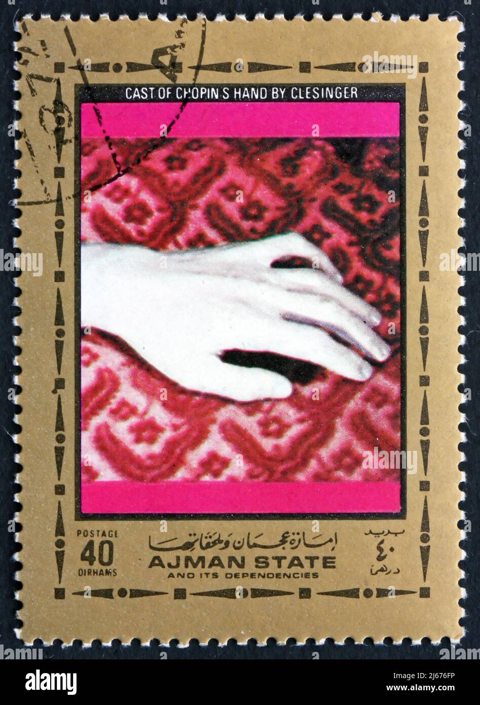 AJMAN - CIRCA 1972: a stamp printed in the Ajman shows Cast of Chopins Hand by Auguste Clesinger, French Sculptor and Painter, circa 1972 Stock Photo