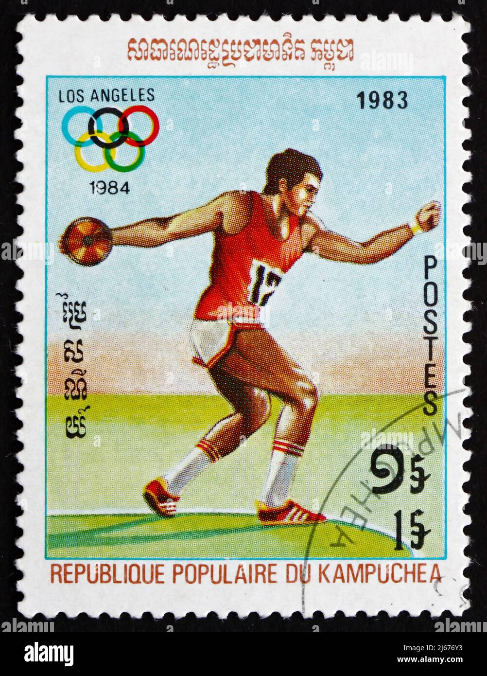 CAMBODIA - CIRCA 1983: a stamp printed in Cambodia shows Discus Throw, 1984 Summer Olympic Games, Los Angeles, circa 1983 Stock Photo