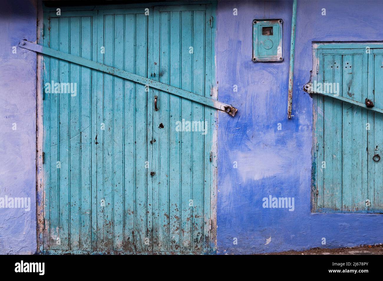 Green doors and blue wall in Chefchouen, Morocco Stock Photo Alamy