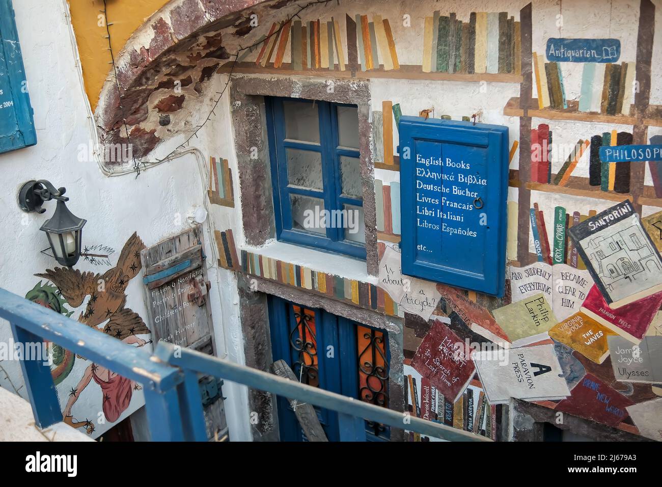 Oia, Greece - May 11, 2021 : The entrance of a traditional book store in the picturesque area of Oia in Santorini Stock Photo
