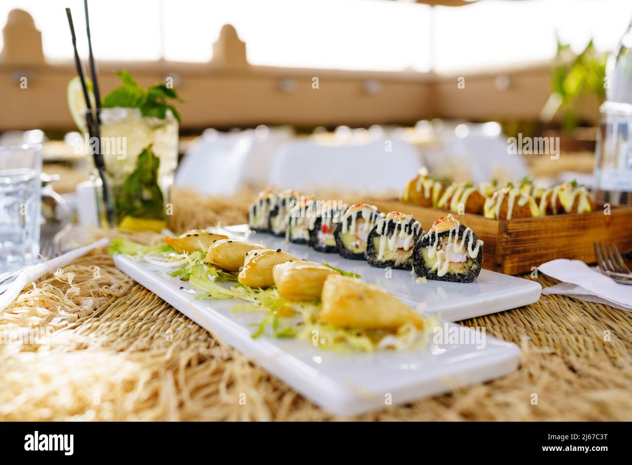 Traditional Moroccan food in Marrakesh with Couscous Sushi and Mojito  Stock Photo
