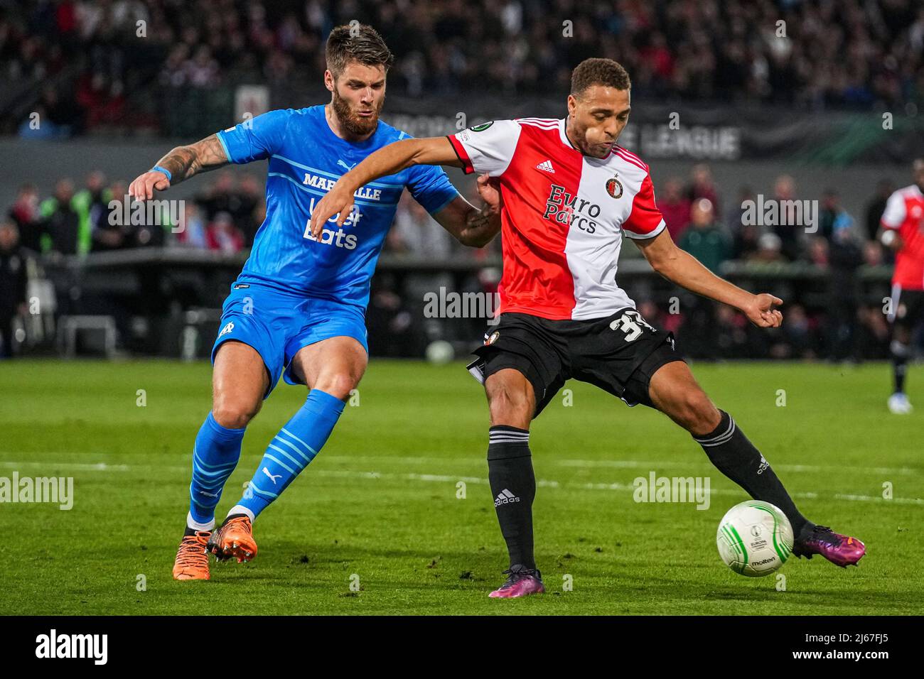 Rotterdam, Netherlands. 28th Apr, 2022. Rotterdam - Duje Caleta-Car of Olympique Marseille, Cyriel Dessers of Feyenoord during the match between Feyenoord v Olympique Marseille at Stadion Feijenoord De Kuip on 28 April 2022 in Rotterdam, The Netherlands. (Box to Box Pictures/Tom Bode) Credit: box to box pictures/Alamy Live News Stock Photo