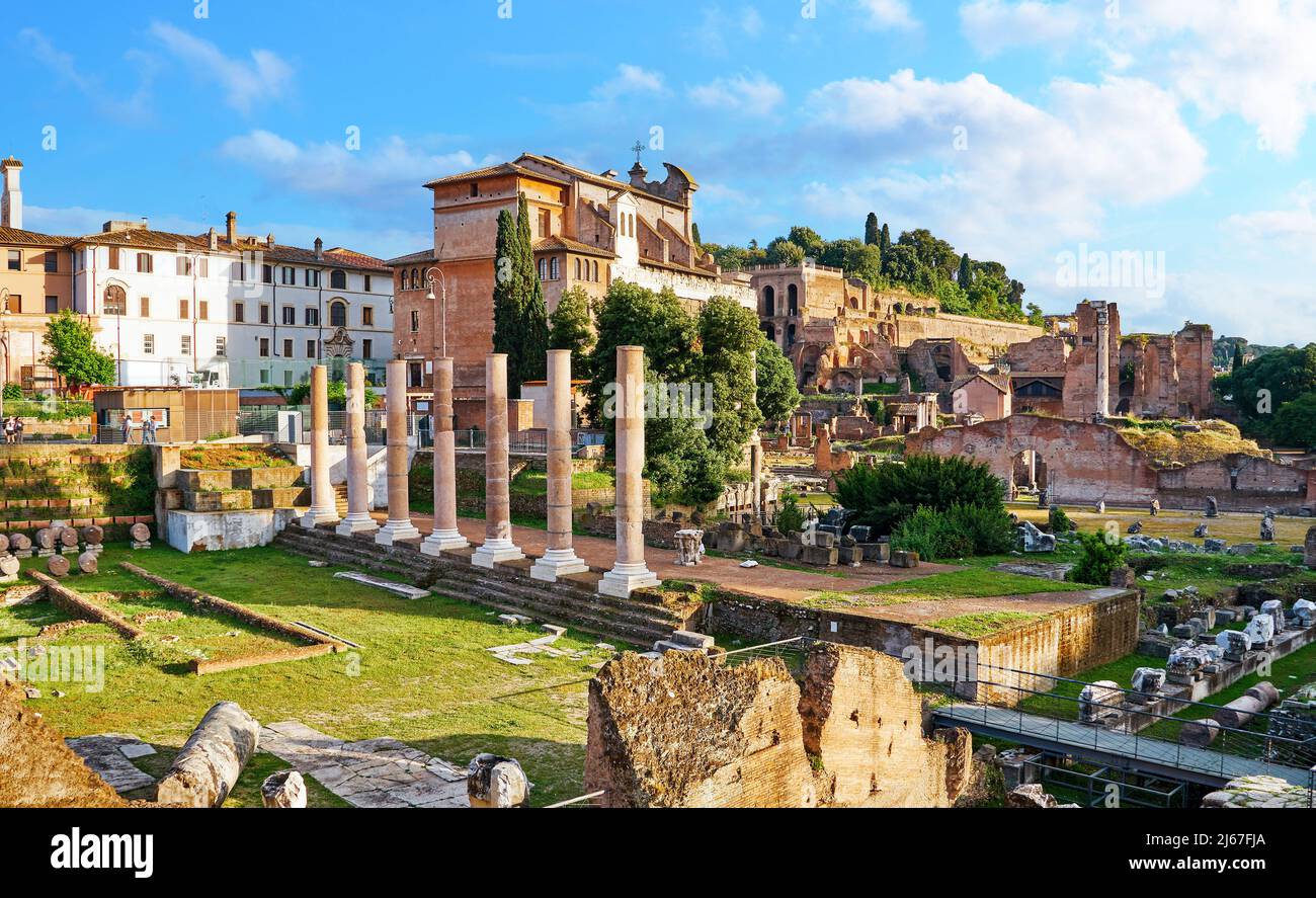 Ancient ruins of the antique Roman Forum in the capital of Italy Rome in the evening. Foro Romano a Roma Stock Photo