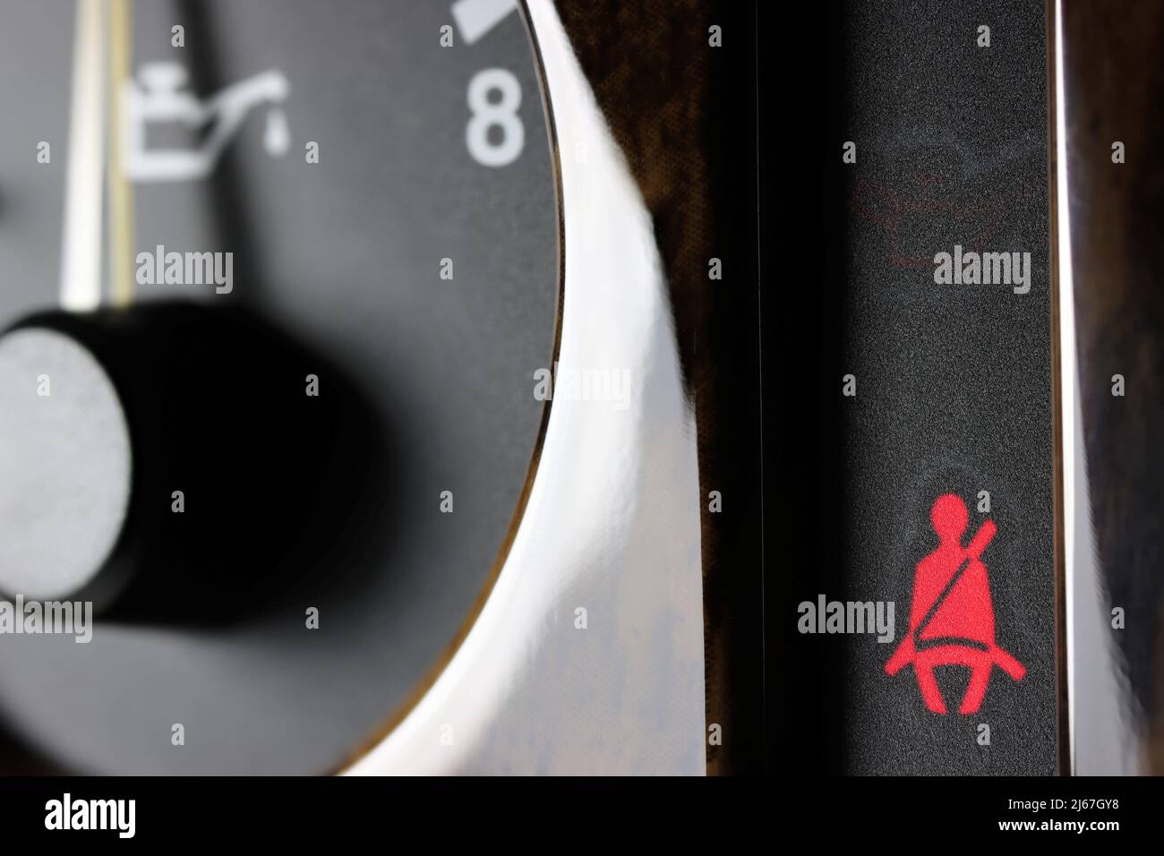 seatbelt warning light in car dashboard Stock Photo Alamy