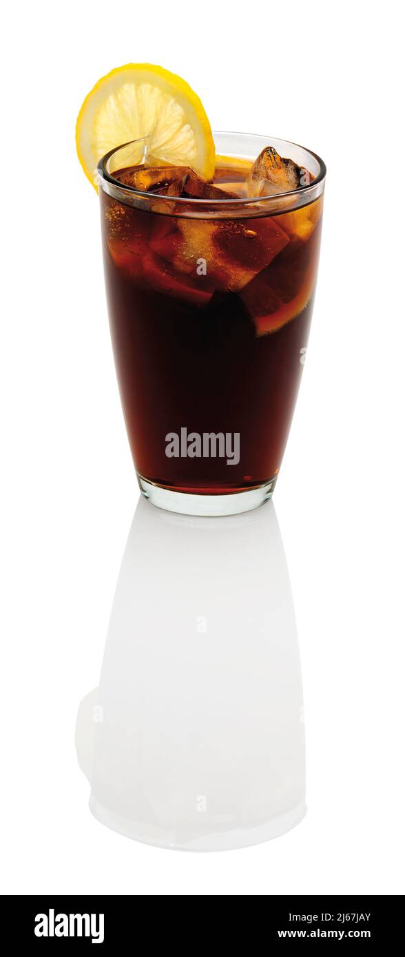 a large glass of cola refreshment with ice cubes and slices of lemon ...
