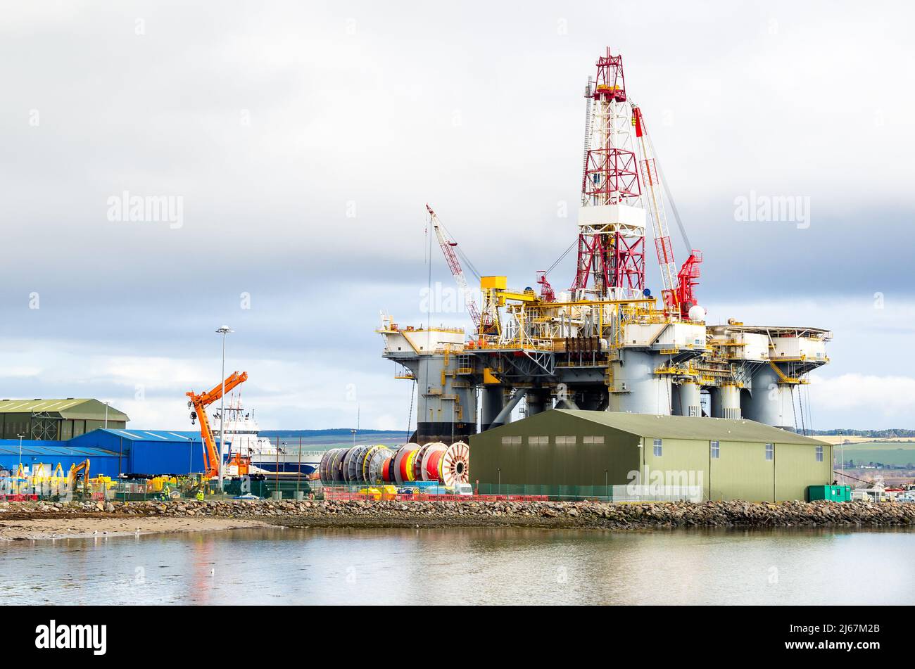 Oil platform in a dry dock for maintenance on a cloudy winter day Stock Photo