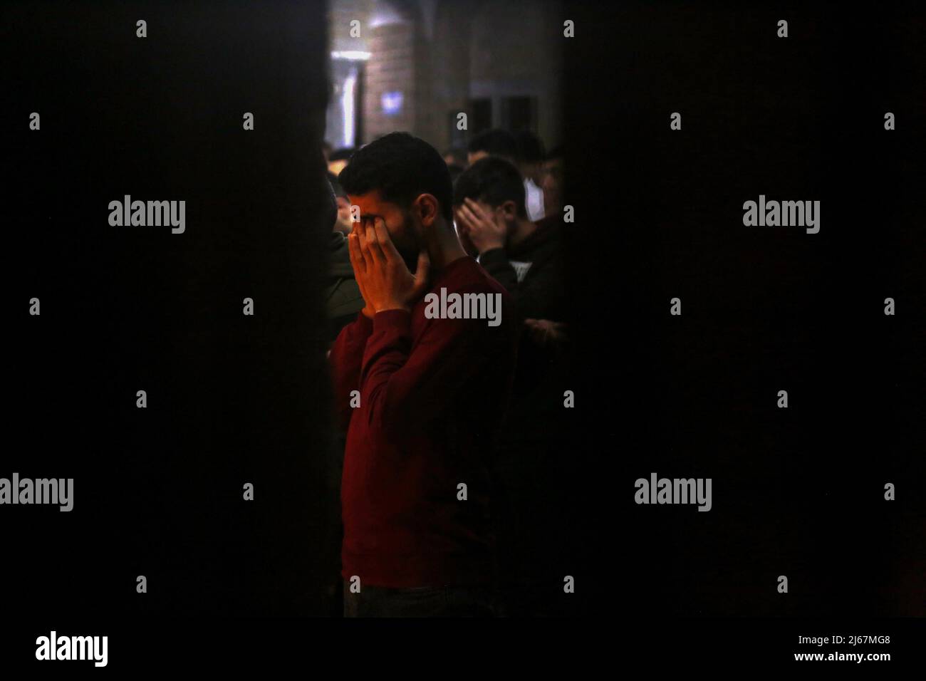 April 28, 2022, Gaza, Gaza Strip, Palestine: Palestinian devotees pray on Laylat al-Qadr for this night, the 27th of Ramadan, at Al-Omari Mosque and Al-Sayed Hashem Mosque in the center of Gaza City. (Credit Image: © Samar Abu Elouf/ZUMA Press Wire) Stock Photo