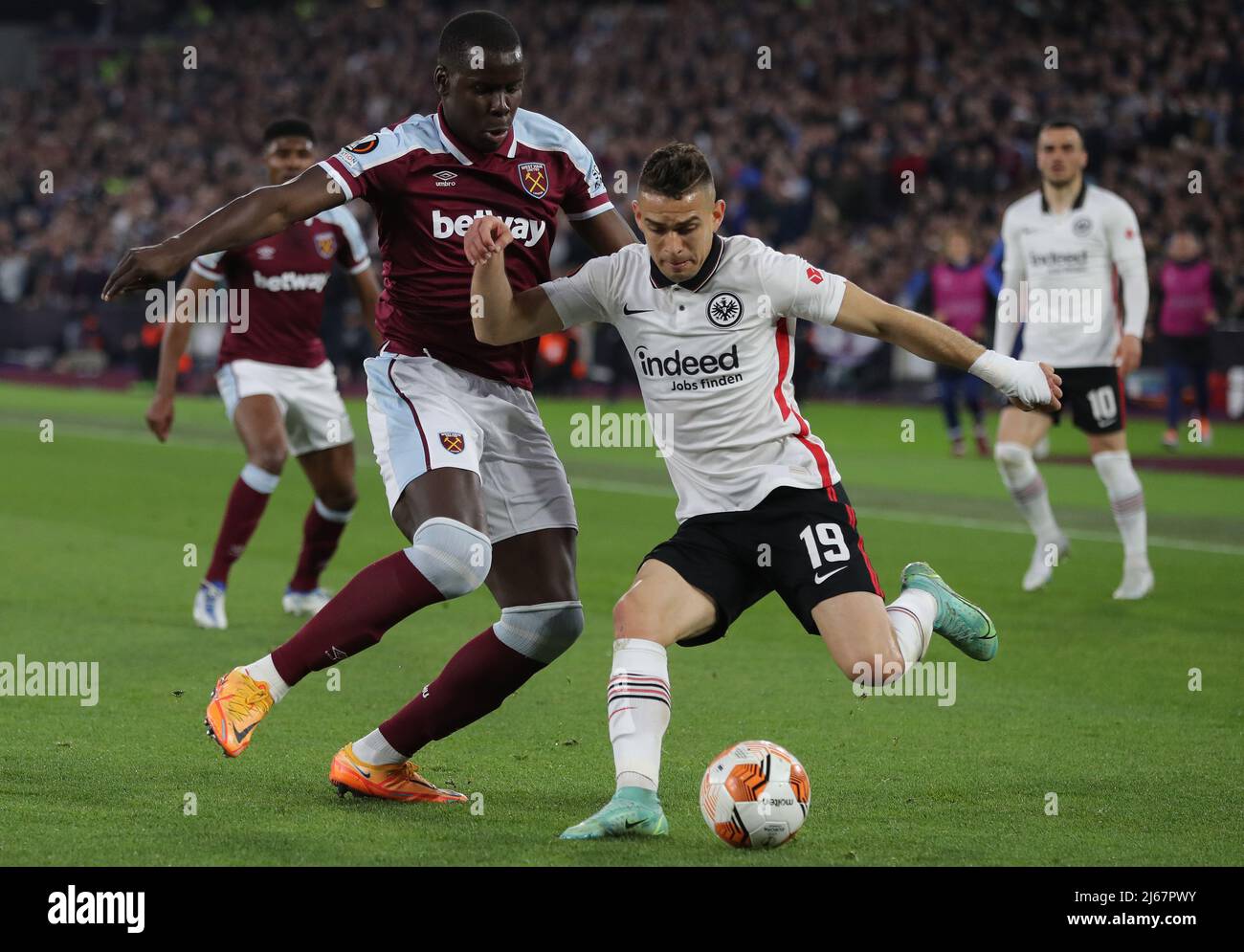London, UK. 28th April 2022. Rafael Santos Borré of Eintracht Frankfurt is challenged by Kurt Zouma of West Ham United during the UEFA Europa League match at the London Stadium, London. Picture credit should read: Paul Terry / Sportimage Credit: Sportimage/Alamy Live News Stock Photo