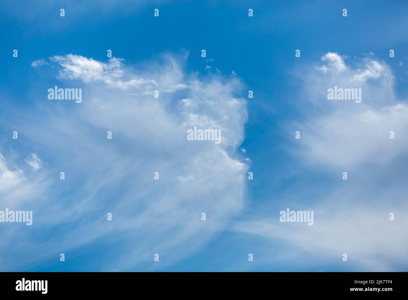 Dense white cloud in the blue sky Stock Photo