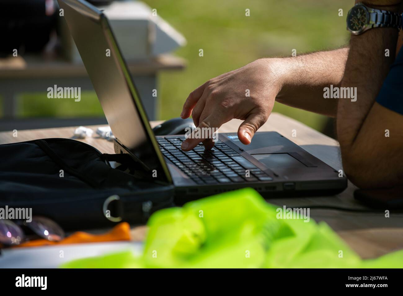 Handsome young blogger sitting outdoors hi-res stock photography and ...