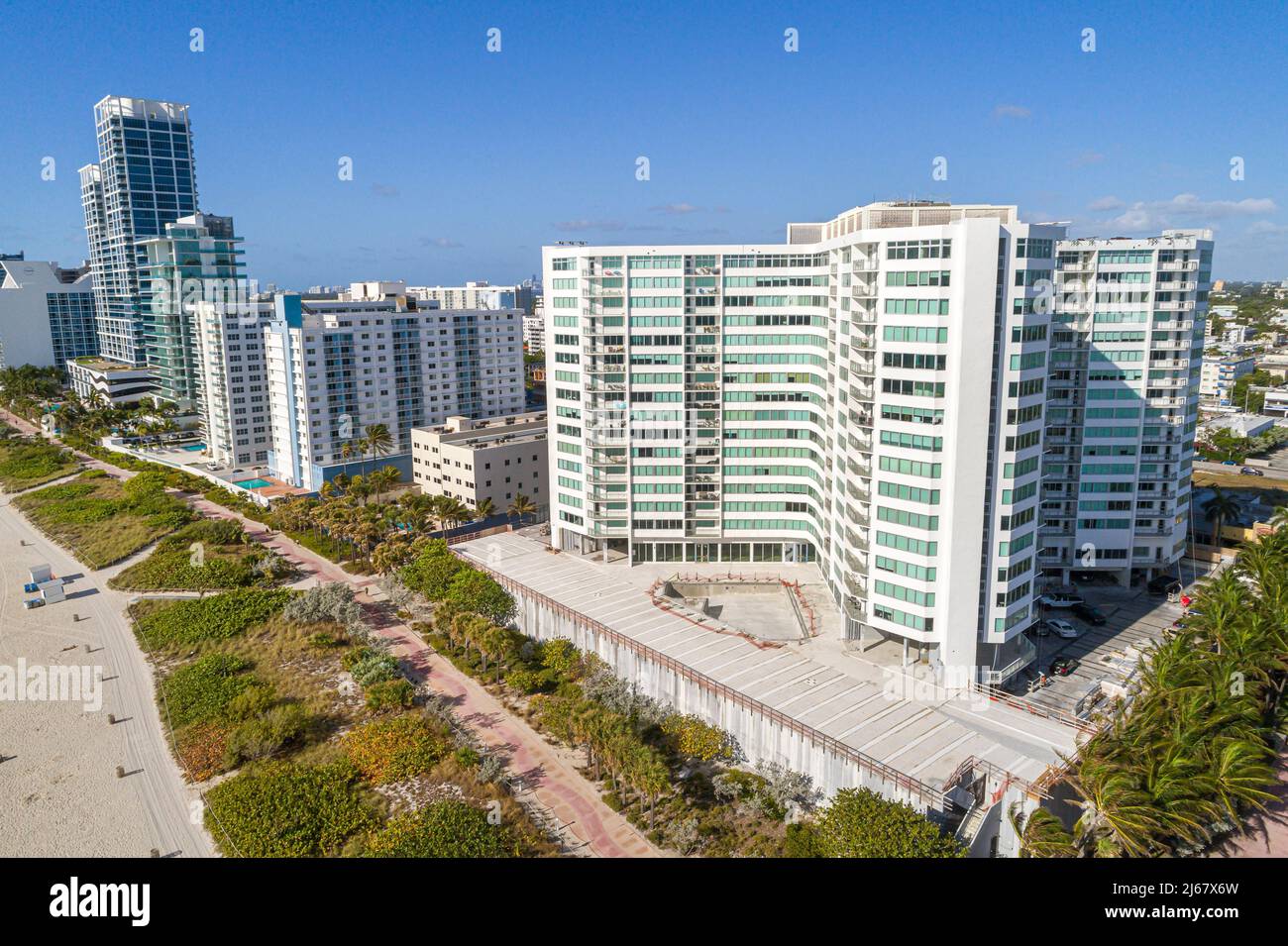 Miami Beach Florida waterfront oceanfront high rise apartment condominium buildings aerial overhead view from above Burleigh House The Collins L'Ateli Stock Photo
