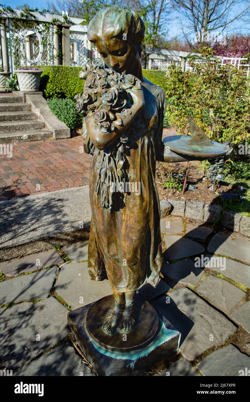 Garden Statue of woman with sundial Brooklyn Botanic Garden USA Stock Photo