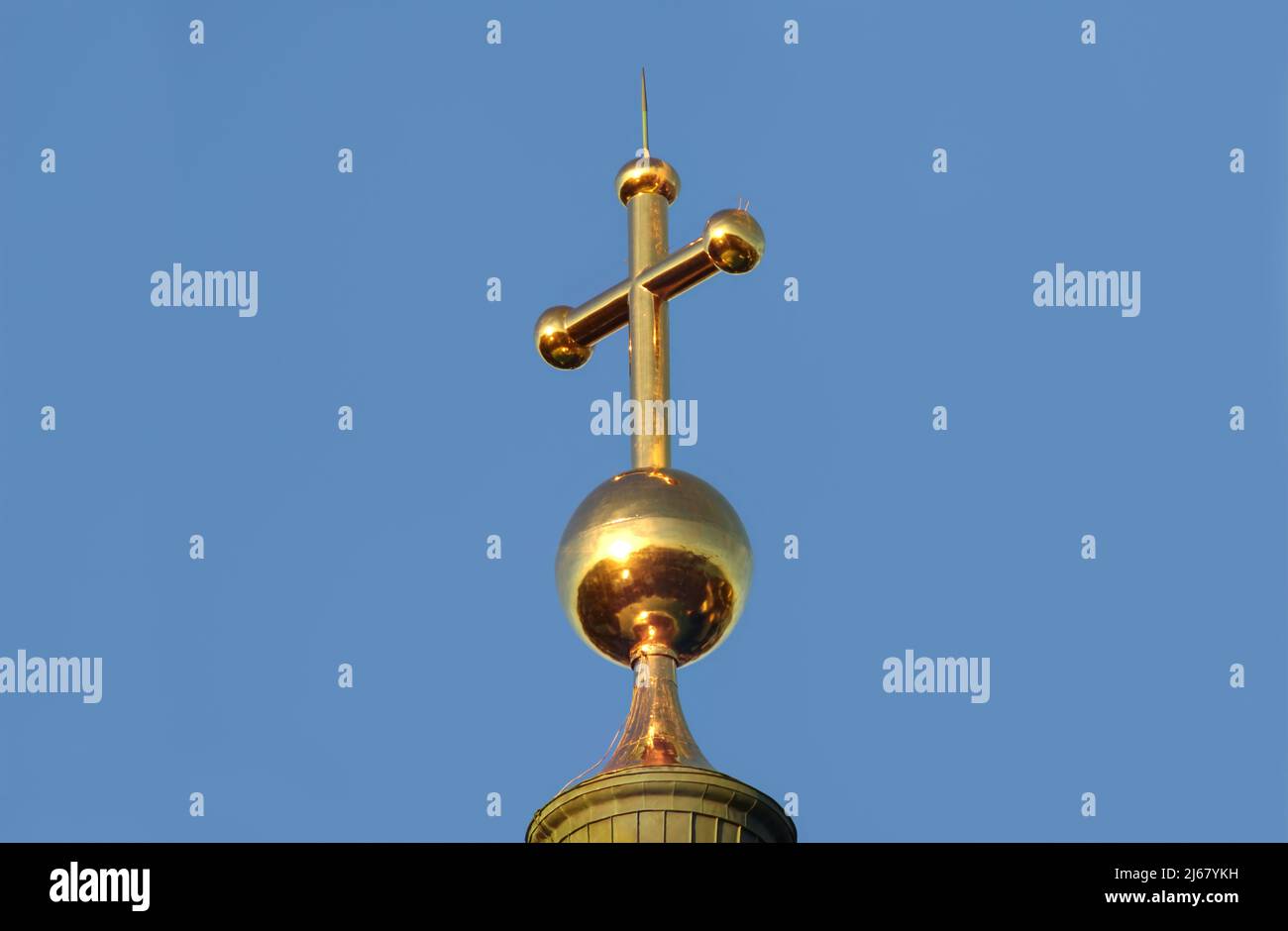 Golden cross on the tower of the Helsinki Lutheran Cathedral in downtown Helsinki, Finland. Stock Photo