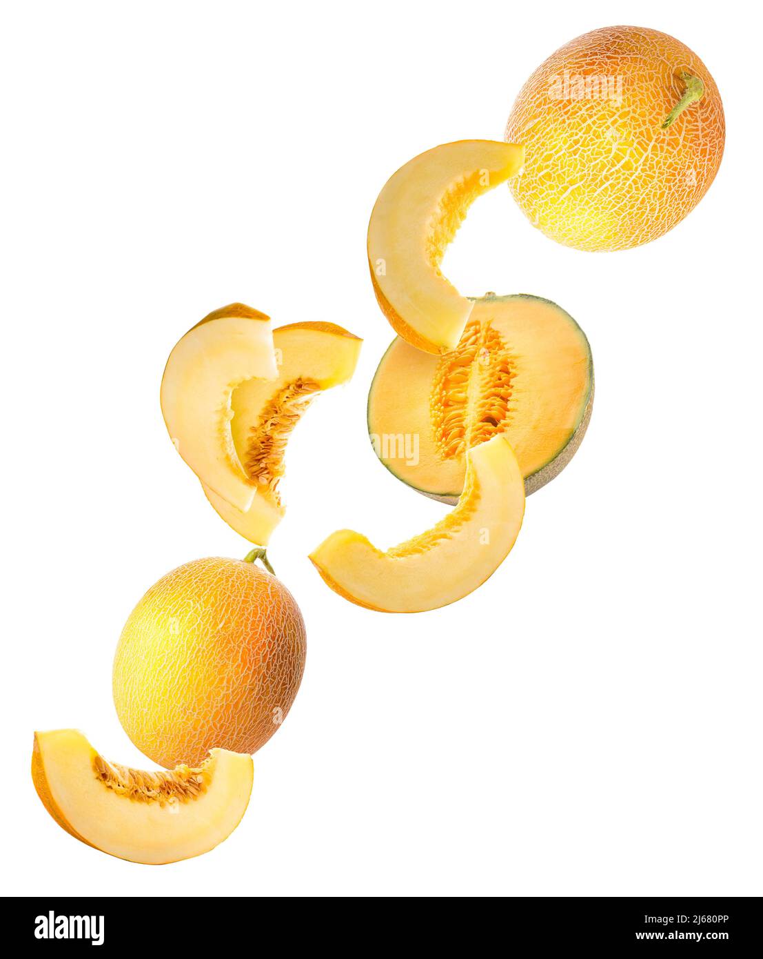 Flying ripe melons and slices isolated on white Stock Photo