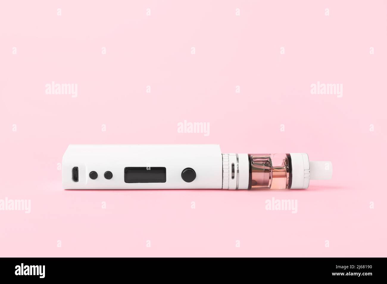 Modern vape mod on pink background Stock Photo - Alamy