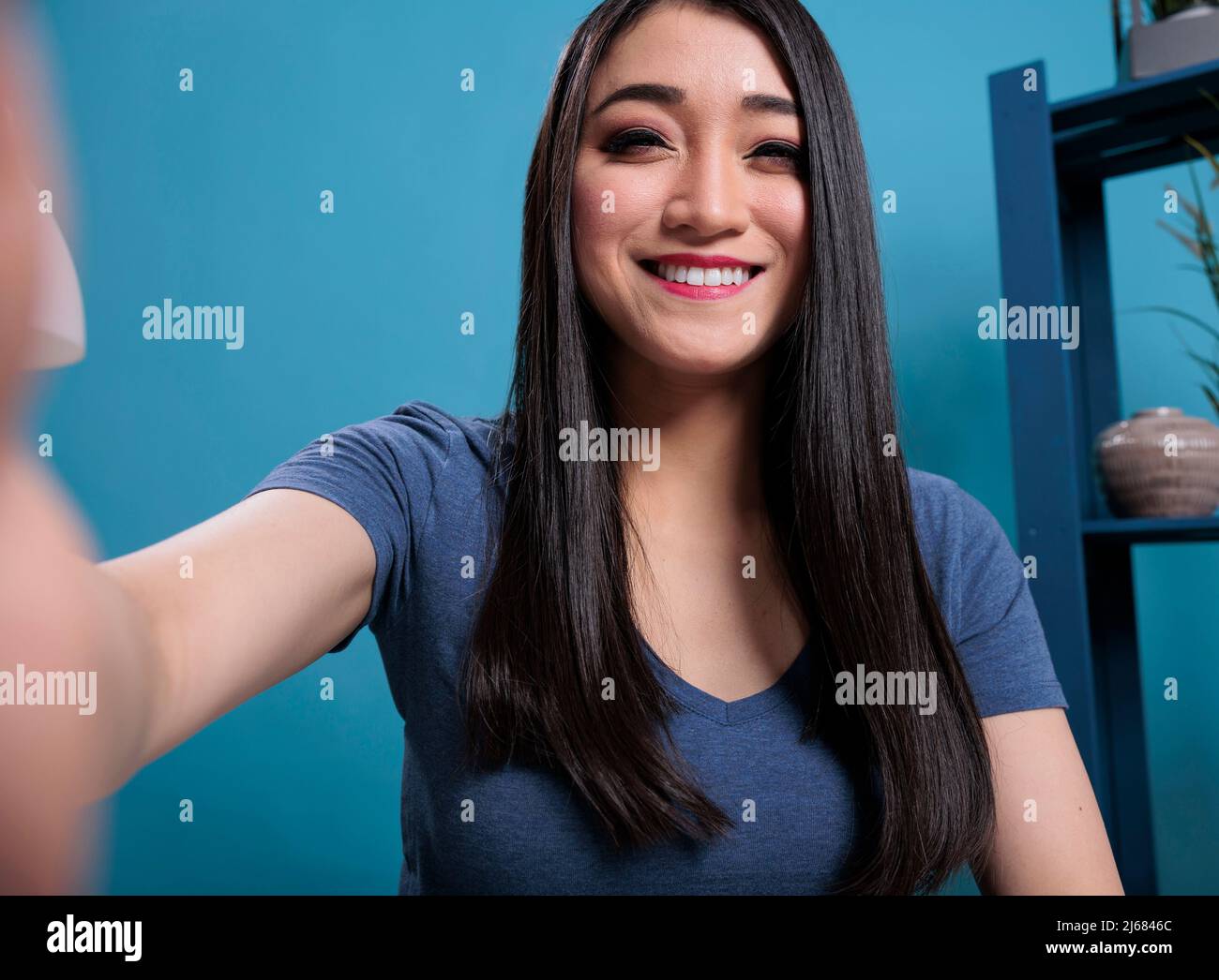 pov-of-social-media-influencer-smiling-at-camera-while-recording