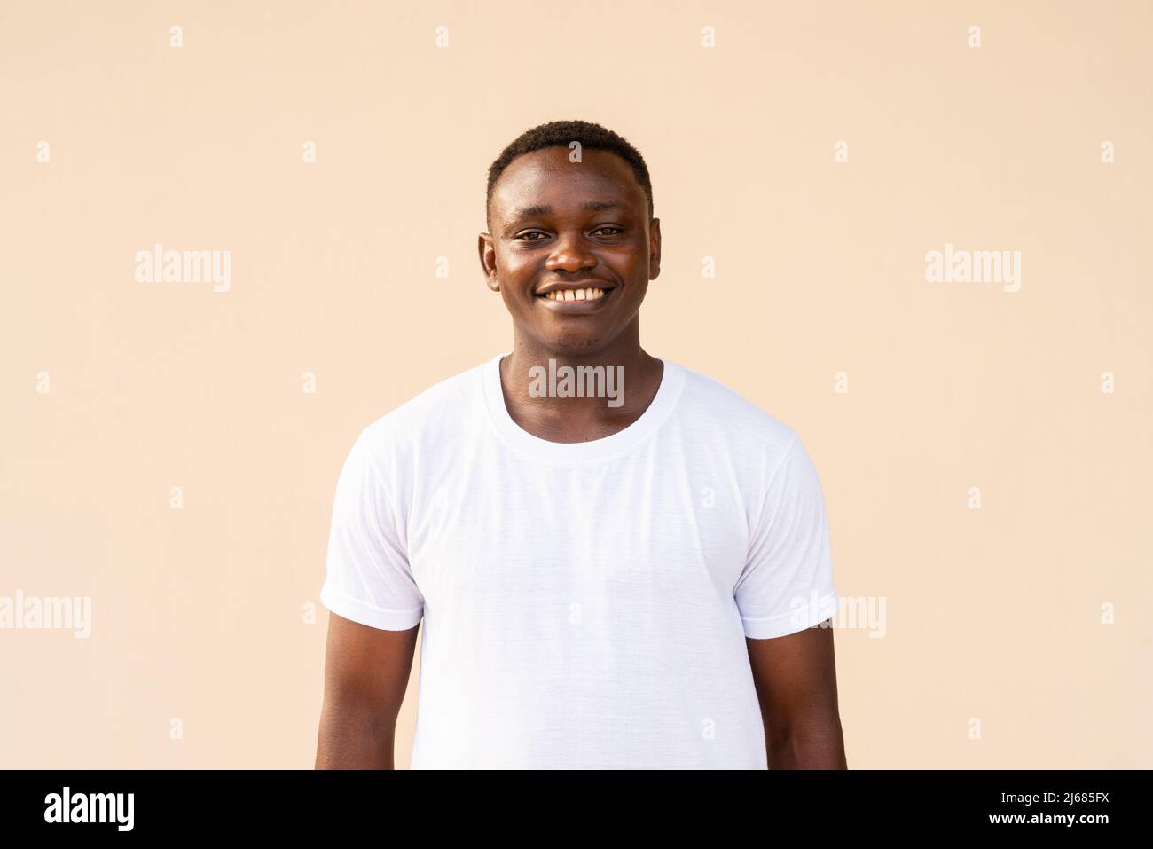 Portrait of handsome young African man wearing t-shirt Stock Photo