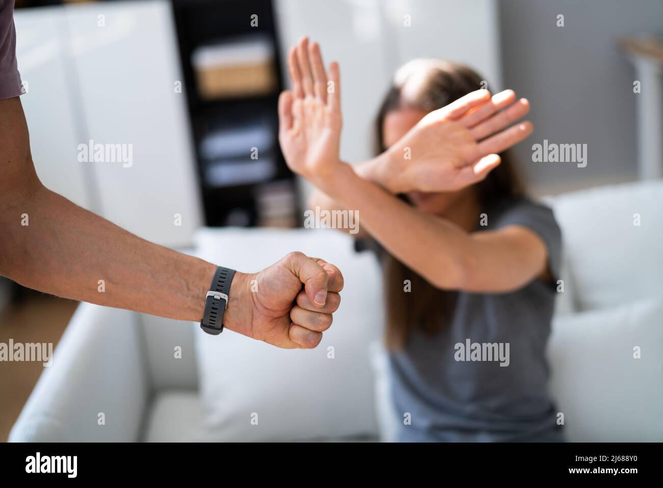 Couple Fight. Woman Crying On Knees. Infidelity Dispute Stock Photo