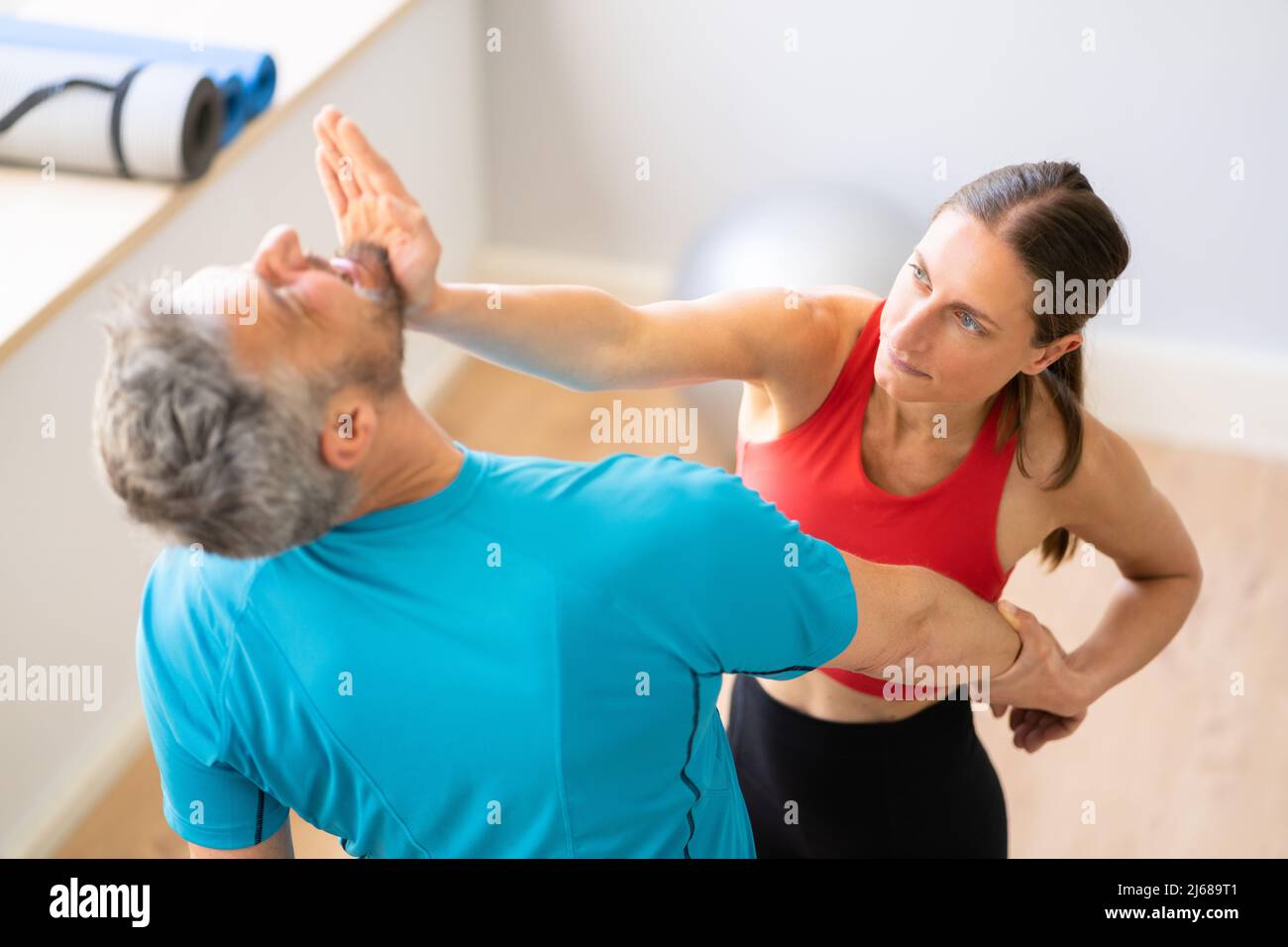 Fight Sparring Fitness Training In Gym. Female Power And Self Defense Stock Photo