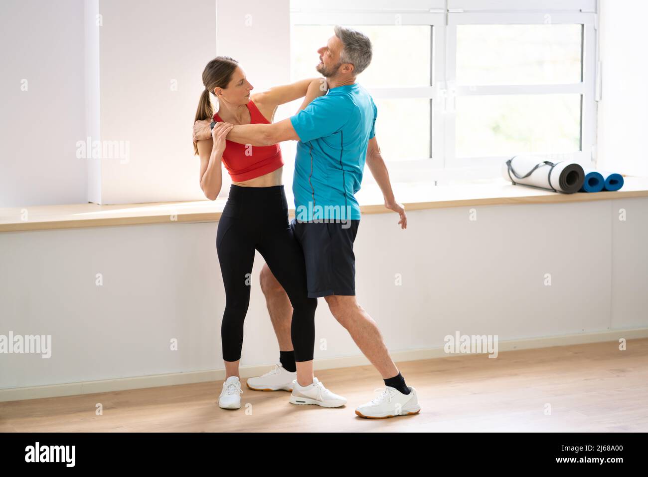 Fight Sparring Fitness Training In Gym. Female Power And Self Defense Stock Photo