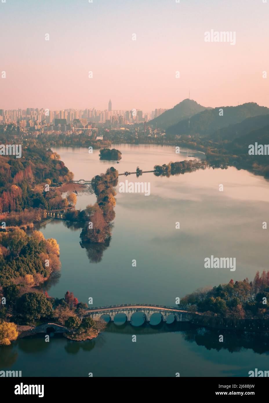 The bridge across the lake Stock Photo - Alamy