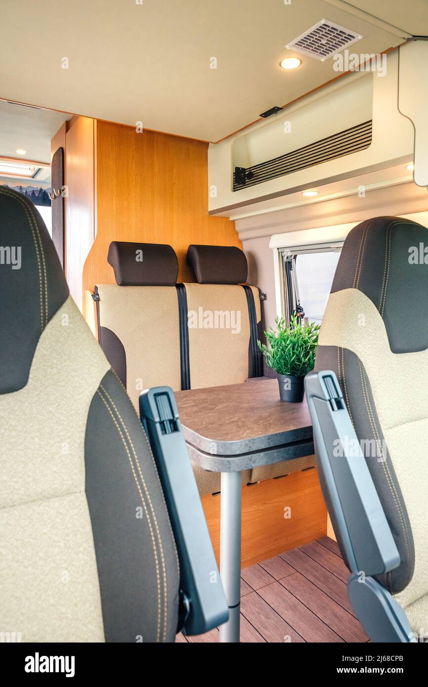 Interior of a camper van with table Stock Photo