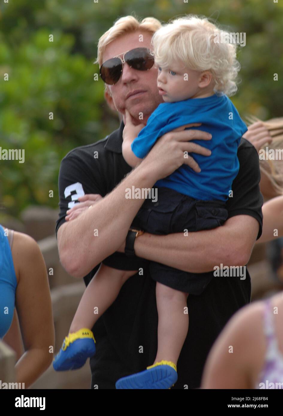 MIAMI BEACH, FL - SEPTEMBER 04: Tennis champ Boris Becker's and wife Sharlely Kerssenberg ('Lilly', model, m. Jun-2009, one son), spend some pool time with their sons Noah Gabriel (b. 18-Jan-1994), Elias Balthasar (b. 4-Sep-1999), and 1-year-old son Amadeus. Lilly and Boris were at the pool with Boris's X-wife Barbara Feltus (m. 17-Dec-1993, div. 15-Jan-2001, two sons) for one of her sonÕs birthday.  On September 4, 2011 in Miami, Florida.    People:   Boris Becker Amadeus Becker Stock Photo