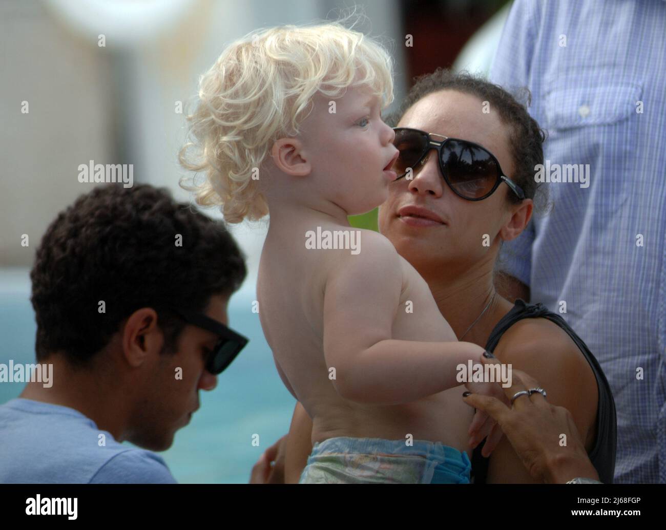 MIAMI BEACH, FL - SEPTEMBER 04: Tennis champ Boris Becker's and wife Sharlely Kerssenberg ('Lilly', model, m. Jun-2009, one son), spend some pool time with their sons Noah Gabriel (b. 18-Jan-1994), Elias Balthasar (b. 4-Sep-1999), and 1-year-old son Amadeus. Lilly and Boris were at the pool with Boris's X-wife Barbara Feltus (m. 17-Dec-1993, div. 15-Jan-2001, two sons) for one of her sonÕs birthday.  On September 4, 2011 in Miami, Florida.   People:  Sharlely Kerssenberg Amadeus Becker Stock Photo