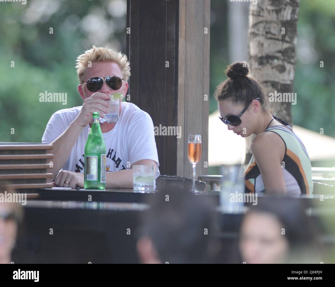 MIAMI BEACH, FL - DECEMBER 21: Tennis great Boris Becker ( AKA Boris Franz Becker)  along with his Wife Sharlely ÔLillyÕ Kerssenberg (model, m. Jun-2009, one son). The former tennis player was spotted relaxing at a hotel in Florida while his wife Sharlely ÔLillyÕ Kerssenberg soaked up the sunshine in a tiny two-piece at their South Beach Hotel.  on December 21, 2011 in Miami Beach, Florida     People:  Boris Becker Sharlely Kerssenberg Stock Photo