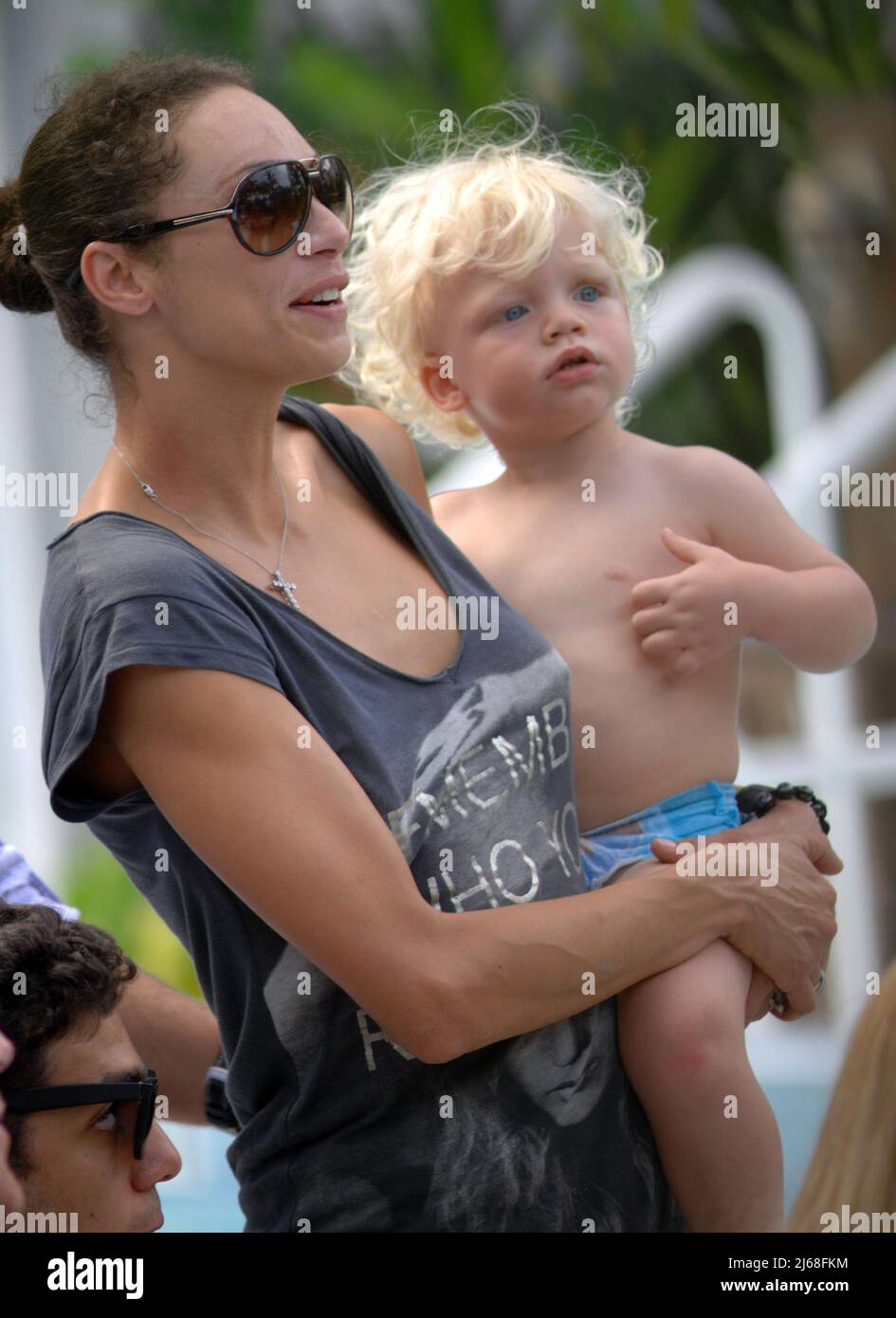 MIAMI BEACH, FL - SEPTEMBER 04: Tennis champ Boris Becker's and wife Sharlely Kerssenberg ('Lilly', model, m. Jun-2009, one son), spend some pool time with their sons Noah Gabriel (b. 18-Jan-1994), Elias Balthasar (b. 4-Sep-1999), and 1-year-old son Amadeus. Lilly and Boris were at the pool with Boris's X-wife Barbara Feltus (m. 17-Dec-1993, div. 15-Jan-2001, two sons) for one of her sonÕs birthday.  On September 4, 2011 in Miami, Florida.   People:  Sharlely Kerssenberg Amadeus Becker Stock Photo