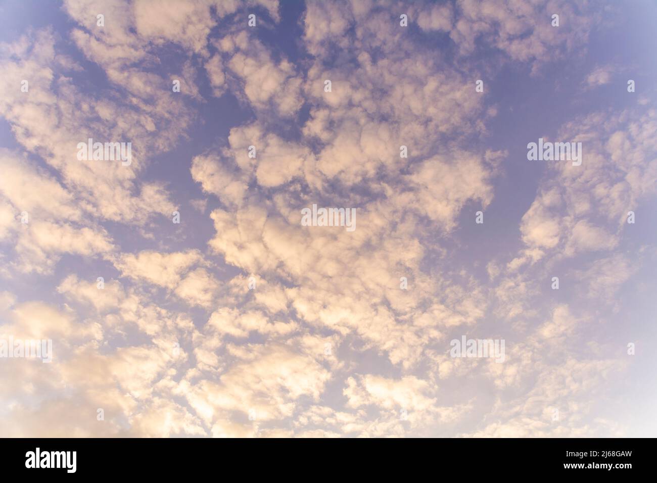 Evening blue sky and white clouds hi-res stock photography and images ...