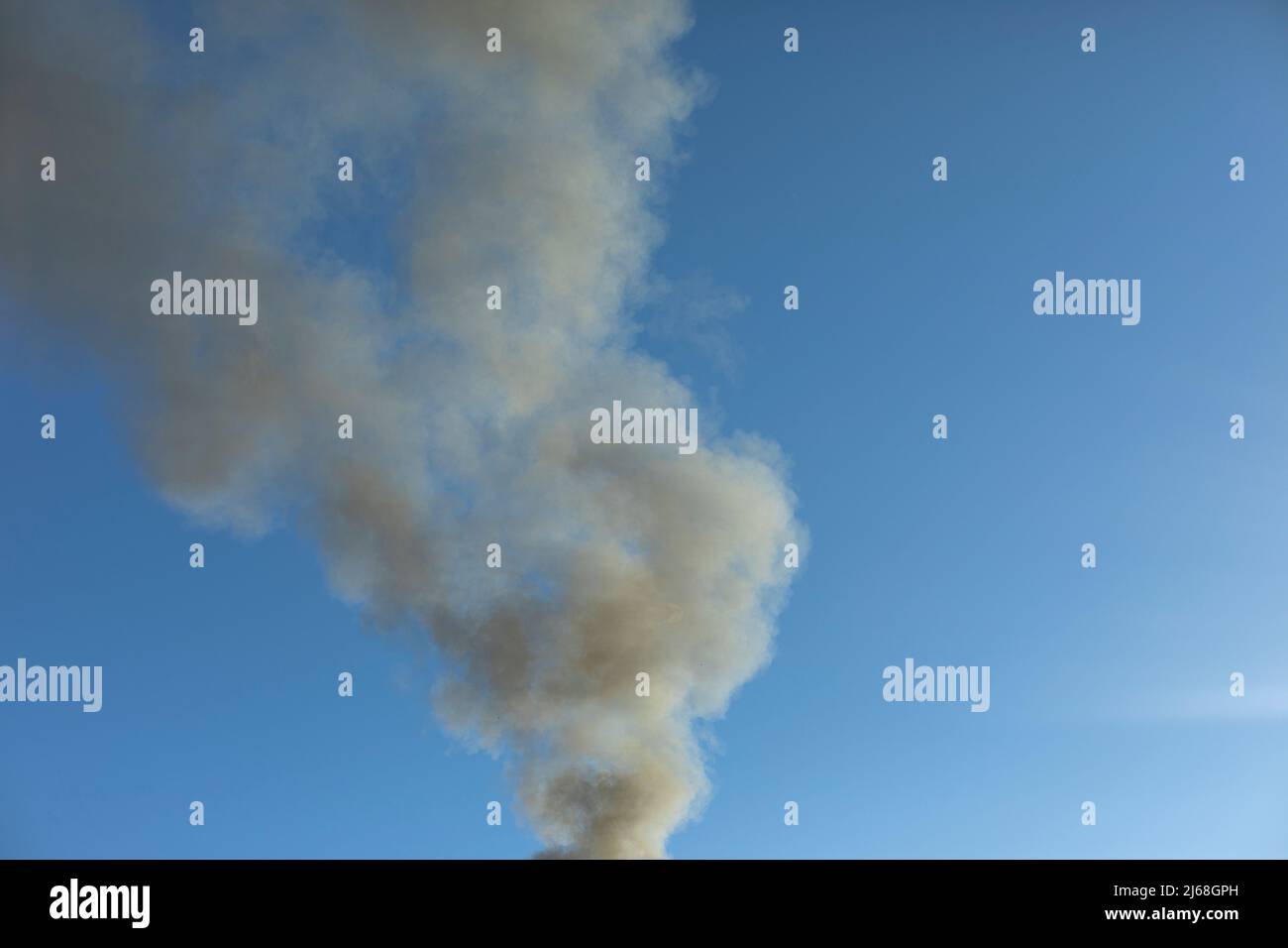 Smoke and sky. Black smoke billows in air. Air pollution Stock Photo Alamy