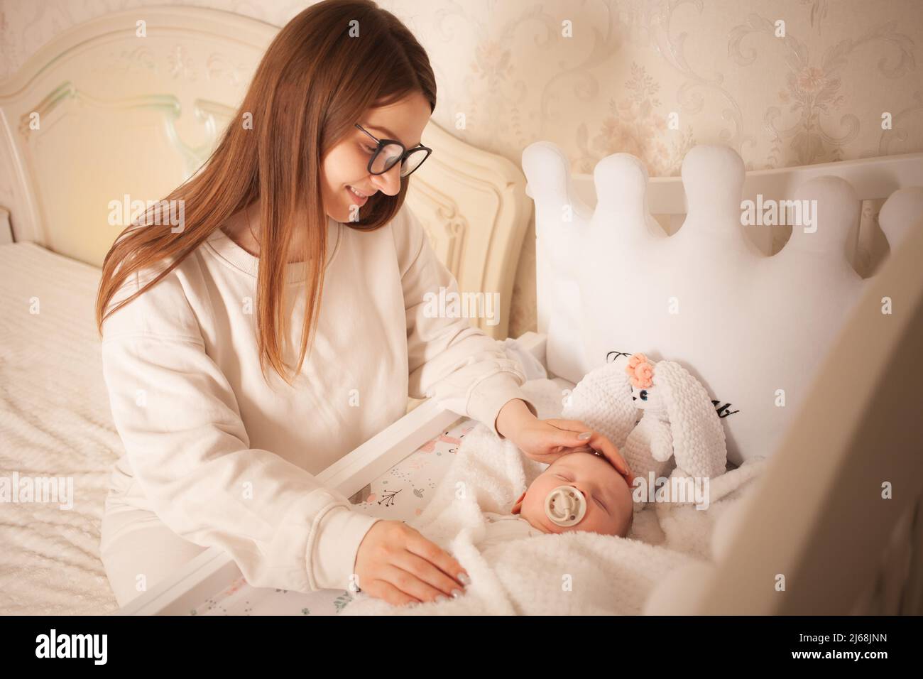 Bed in nursery for cheap mom