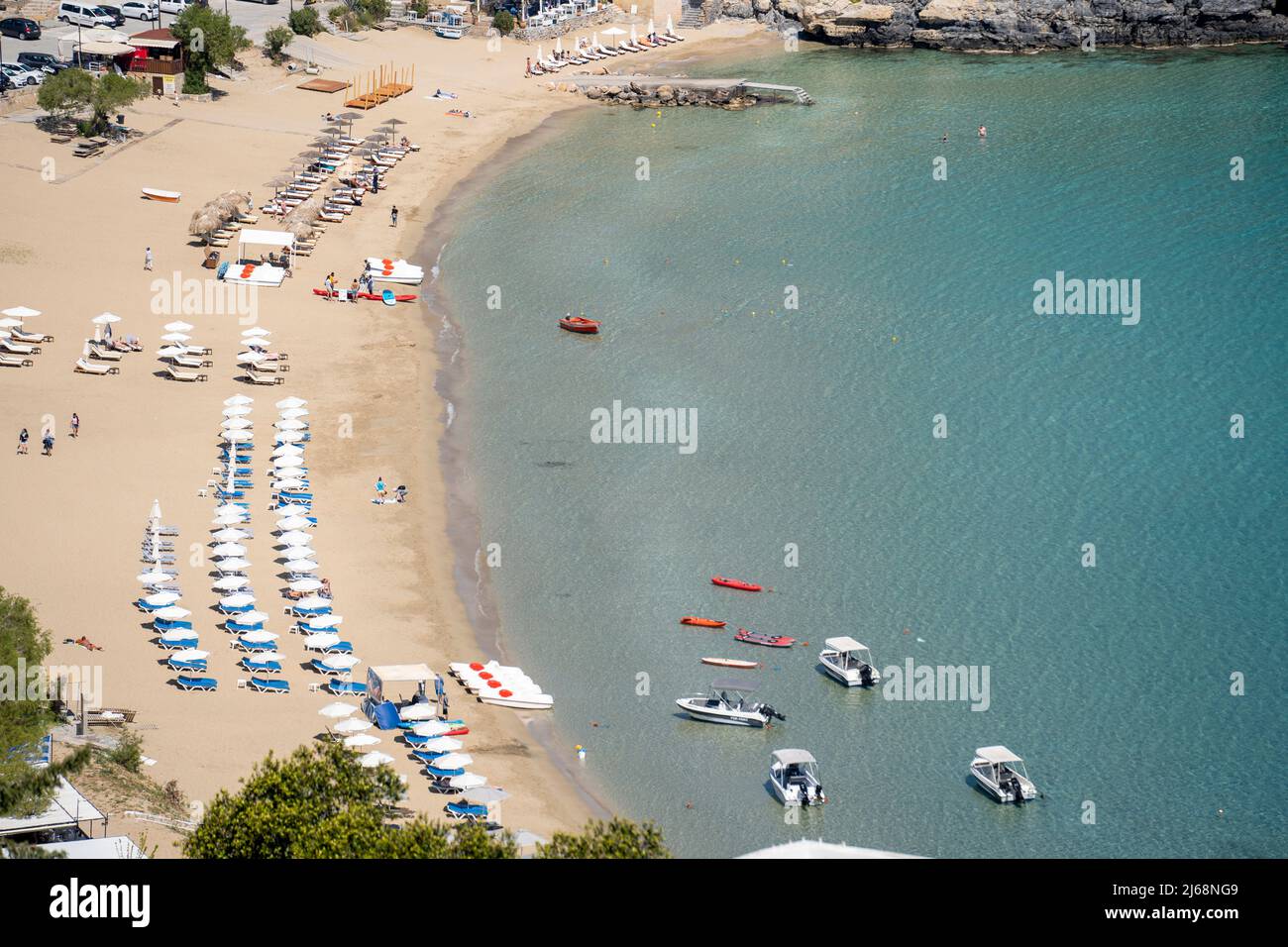 The beach  Pallas Beach  at  Lindos city in Greece. Stock Photo