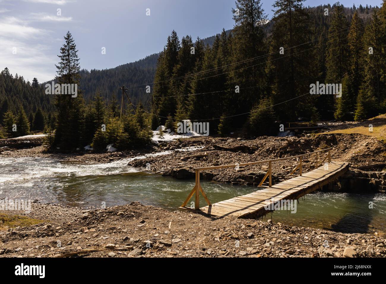 Wooden bridge above mountain hi-res stock photography and images - Alamy
