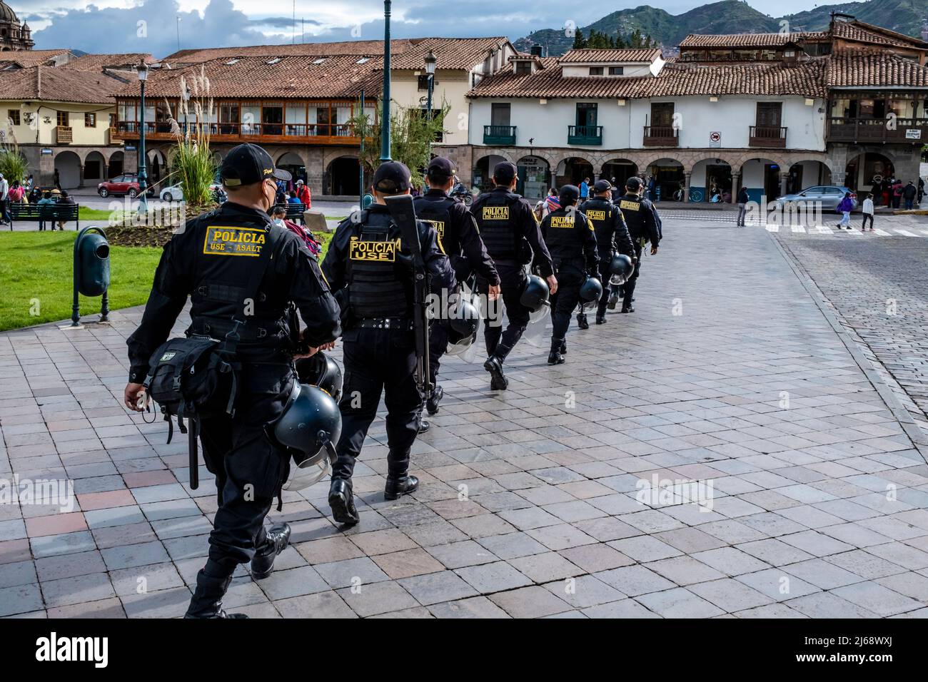 Peruvian Police Officers In Plaza De Armas, Cusco, Cusco Province, Peru. Stock Photo