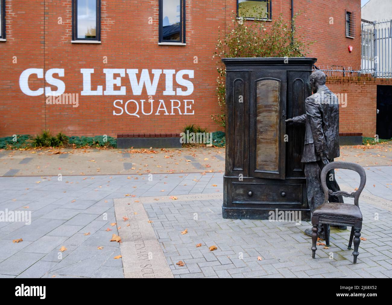 CS Lewis square with Person entering wardrobe sculpture in CS Lewis square in east belfast Stock Photo