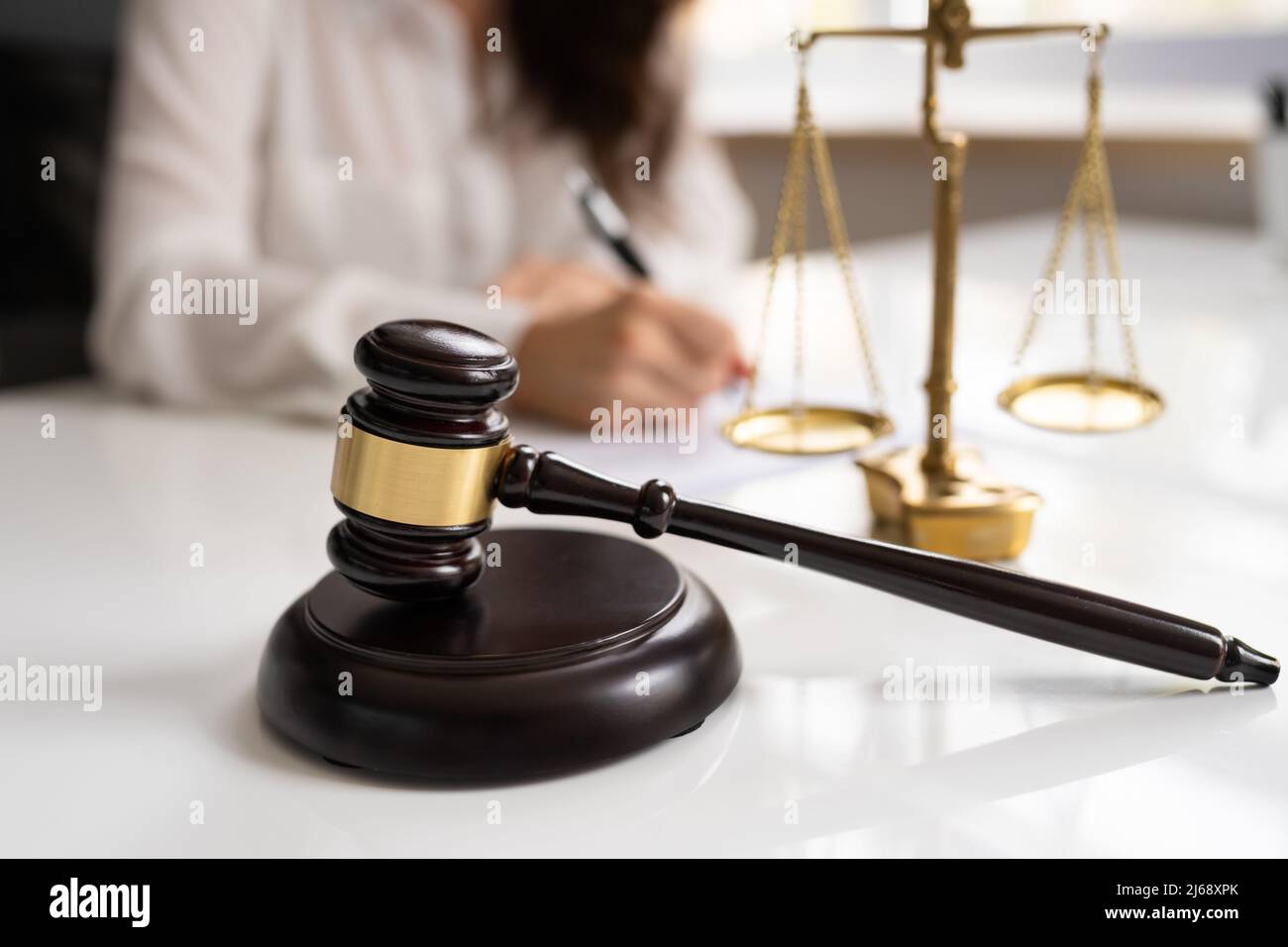 Female Lawyer In Courtroom At Litigation Trial Stock Photo