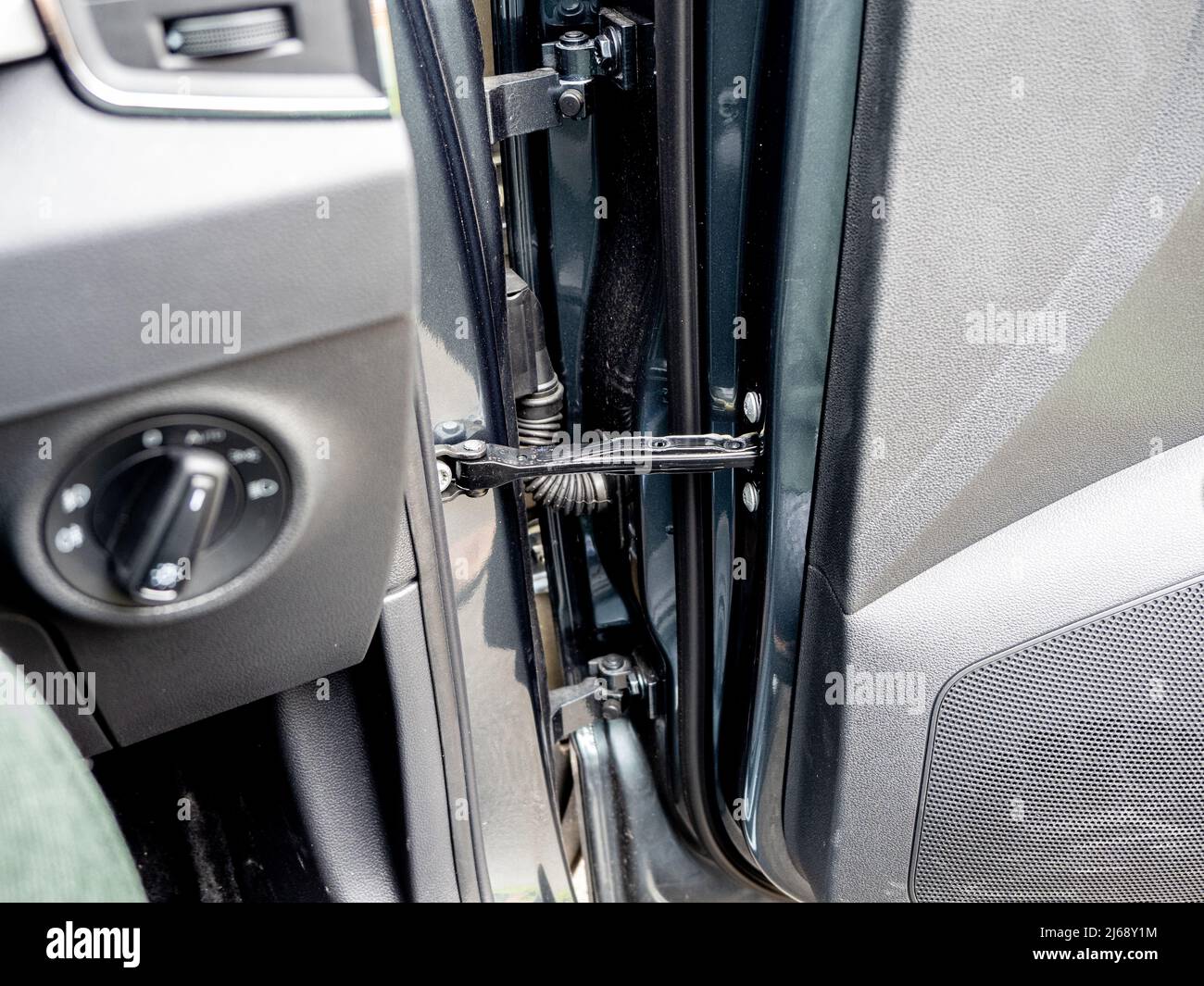 auto car door hinge pins and mechanical and electrical assembly  detail Stock Photo