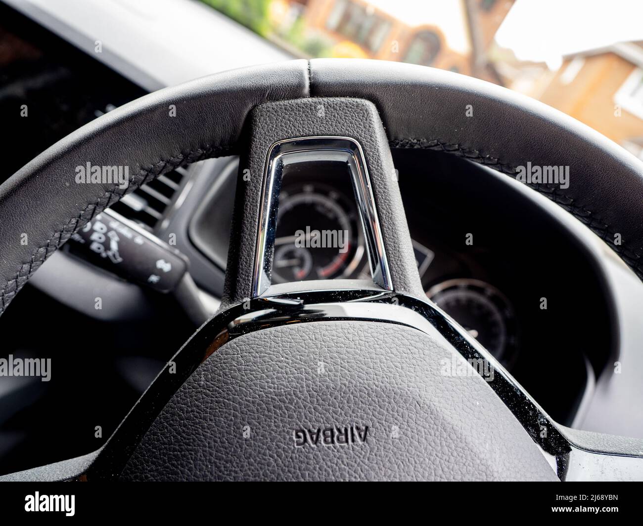 close up of auto steering wheel with fitted airbag mechanism Stock Photo