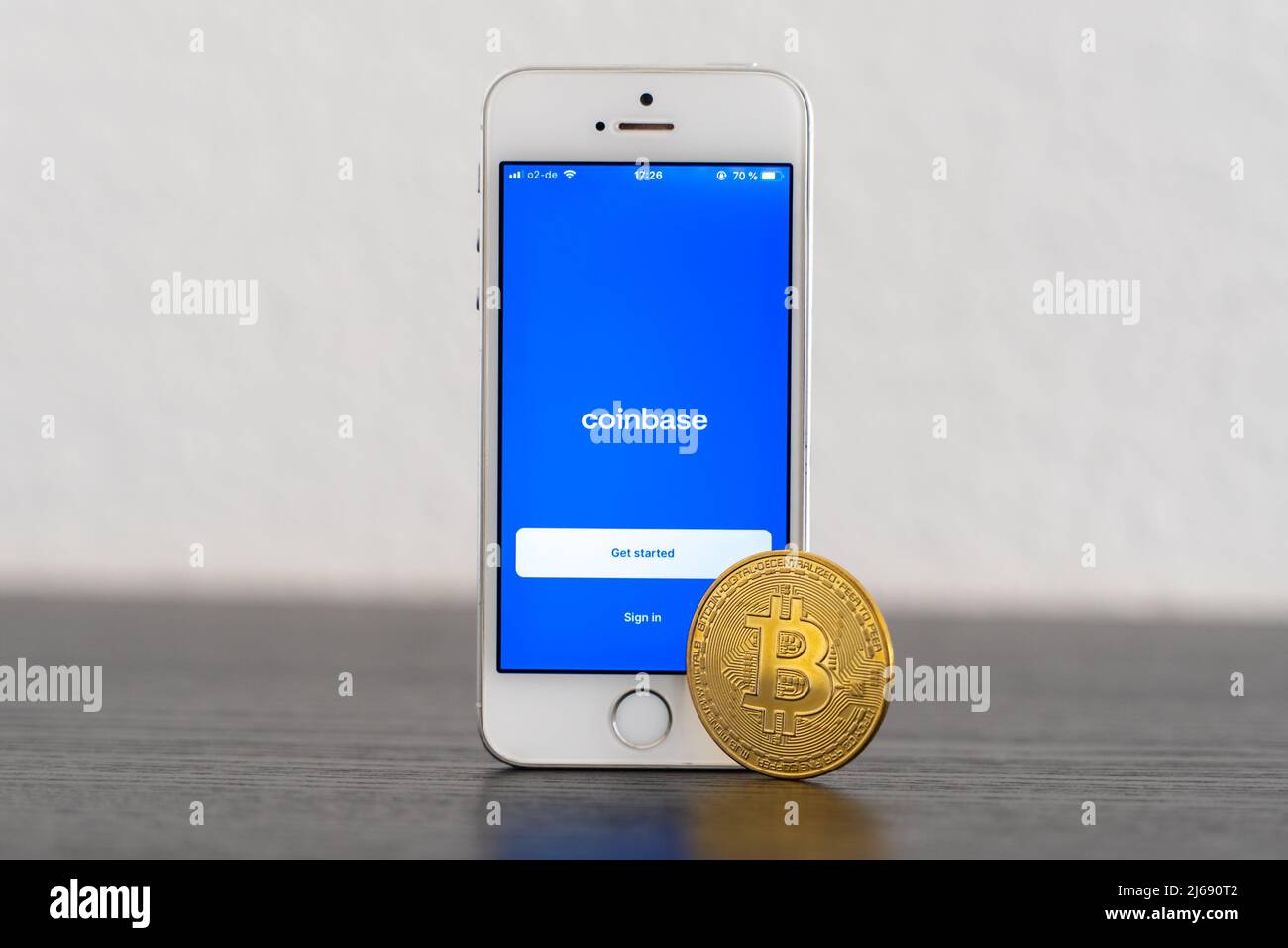 Coinbase app on a smartphone at the day of the IPO on the stock exchange. Marketplace to trade a crypto currency like Bitcoin and Ethereum. Stock Photo