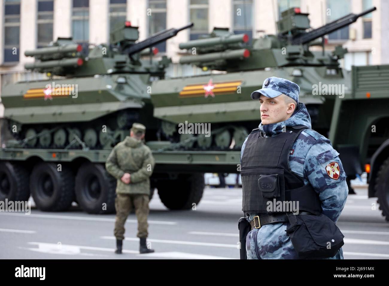 Russian soldiers standing in front of combat multifunctional robotic complex "Uran-9" Stock Photo