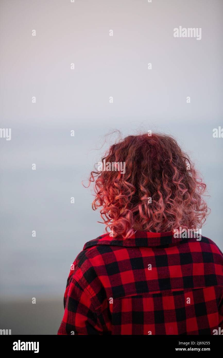 Woman back view curly hair solitude hi-res stock photography and images ...