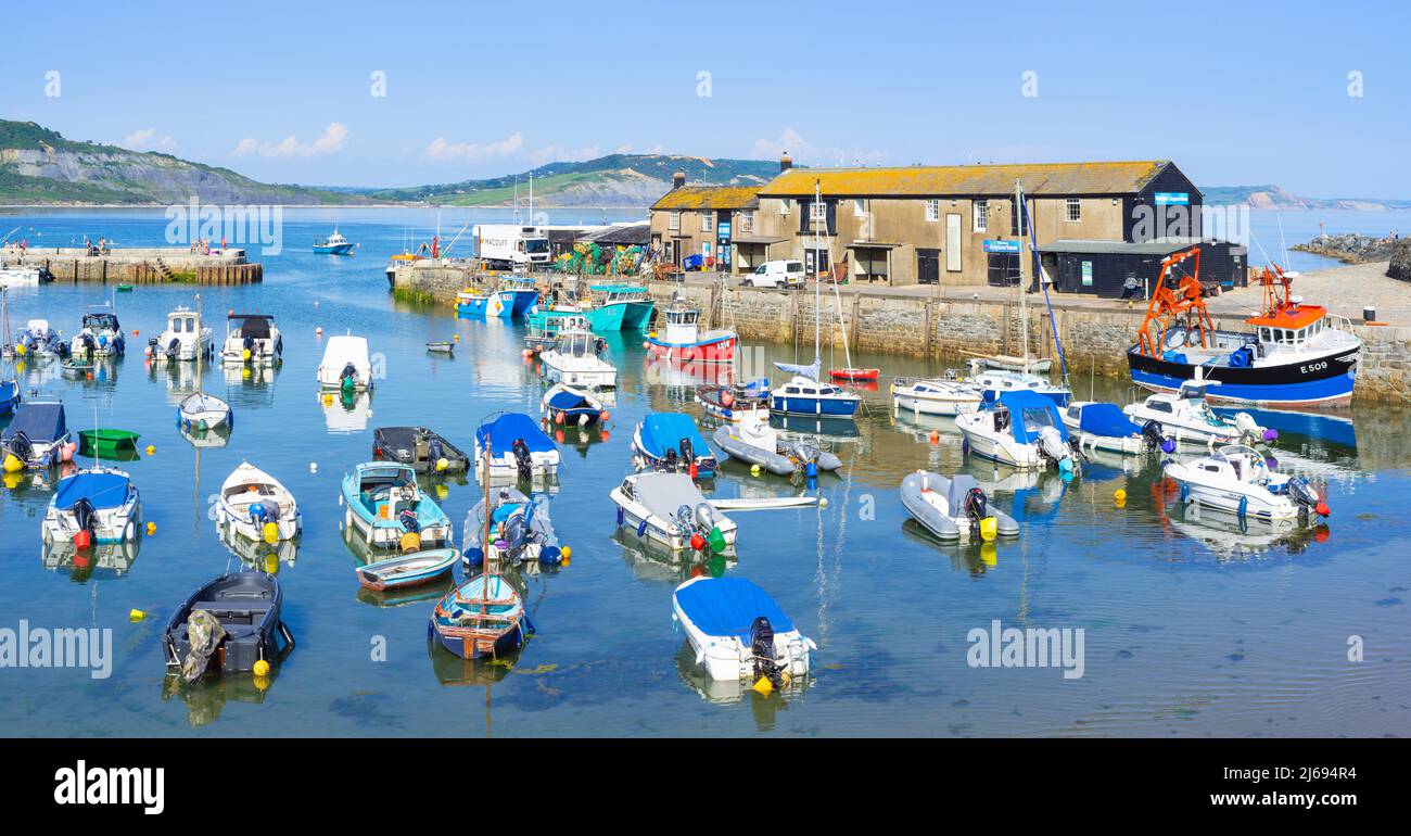 Fishing boats and yachts in the Jurassic Coast harbour at Lyme Regis